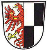 LogoLinks: halber golden bewehrter roter Adler, Rechts: Geviert silber und schwarz