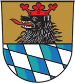 Logooben rot ge­krön­ter schwar­zer Bä­ren­kopf, un­ten die blauen Wecken