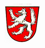 LogoWappen der Stadt Hauzenberg; In Rot ein steigender silberner Wolf.
